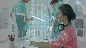 Team member at desk responding to gesture and typing as 3D charts updating for business planning. Collaboration, innovation, technology, analytics, workspace, teamwork, modern - Powered by Shutterstock - Get 15% off with code: PIKWIZARD15