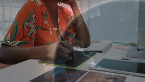 Graphic designer pressing stylus and drawing digital planet overlay while matching color swatch hue. Digital art, creativity, futuristic, innovation, workspace, inspiration, abstract - Powered by Shutterstock - Get 15% off with code: PIKWIZARD15