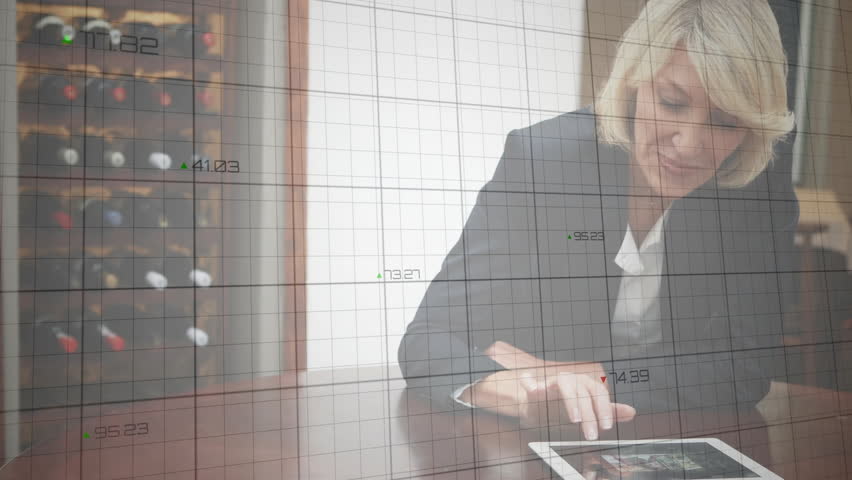 Female business executive tapping tablet and activating line graph overlays for finance data review. Professional, data analysis, digital interface, contemporary, executive, corporate, technological - Powered by Shutterstock - Get 15% off with code: PIKWIZARD15