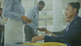 Receptionist scanning ID upon guest presenting pass at event desk with transparent globe rotating. Corporate, networking, technology, professional, modern, diversity, business - Powered by Shutterstock - Get 15% off with code: PIKWIZARD15