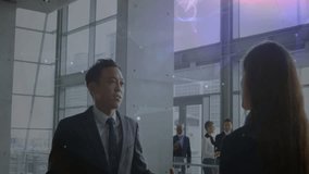 Businessman stepping forward and speaking with hologram overlay mapping links as colleagues join. Office, collaboration, innovation, technology, network, teamwork, modern - Powered by Shutterstock - Get 15% off with code: PIKWIZARD15