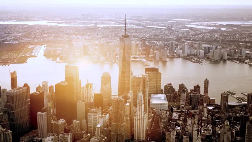 Overlooking view of a modern city business district skyline with iconic landmarks and high-rise buildings. Captured in stunning detail on RED EPIC for cinematic urban visuals.
