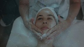 Esthetician scanning client skin with animated node overlay then massaging upward for beauty boost. Skincare, wellness, relaxation, digital technology, beauty, rejuvenation, health - Powered by Shutterstock - Get 15% off with code: PIKWIZARD15