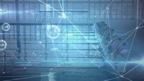 Swimmers launching off blocks at signal diving into pool with sports metrics tracking performance. Athletes, competition, technology, fitness, aquatic, innovation, teamwork - Powered by Shutterstock - Get 15% off with code: PIKWIZARD15