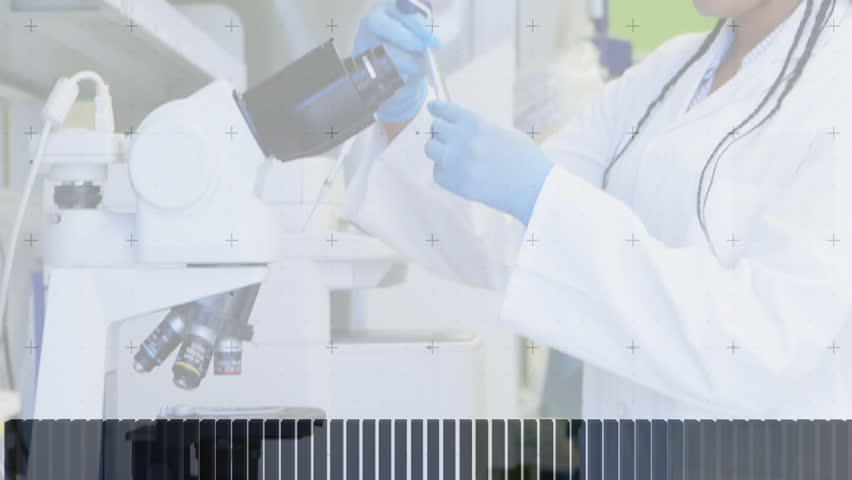 Lab researcher adjusting microscope pipetting sample and viewing digital readout overlay analysis. Scientist, research, laboratory, innovation, precision, science, technology - Powered by Shutterstock - Get 15% off with code: PIKWIZARD15