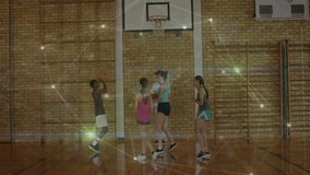 Male teenager shooting basketball under hoop in education gym team tracking flight for rebound. Athletics, teamwork, sport, activity, training, youthful, competitive - Powered by Shutterstock - Get 15% off with code: PIKWIZARD15