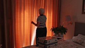 Senior woman packing a suitcase for travel on a bed at home
 - Powered by Shutterstock - Get 15% off with code: PIKWIZARD15