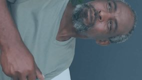 Animation of stock market data processing over african american man drinking coffee at home. Global economy and business technology concept - Powered by Shutterstock - Get 15% off with code: PIKWIZARD15