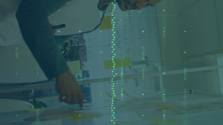 Animation of financial data processing over business people working in office. Global computing, finance, business and data processing concept digitally generated video. - Powered by Shutterstock - Get 15% off with code: PIKWIZARD15