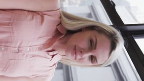 Animation of social media data processing over caucasian businesswoman in office. Global connections, business, finance, data processing and digital interface concept digitally generated video. - Powered by Shutterstock - Get 15% off with code: PIKWIZARD15