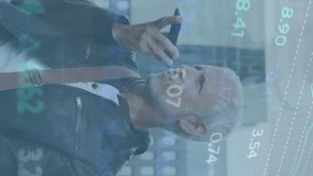 Animation of data processing over caucasian man using smartphone. Global connections, computing, digital interface and data processing concept digitally generated video. - Powered by Shutterstock - Get 15% off with code: PIKWIZARD15