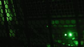 Animation of grey world map over glowing computer servers in dark server room. Data, digital interface, connection, processing, network and global communication, digitally generated video. - Powered by Shutterstock - Get 15% off with code: PIKWIZARD15