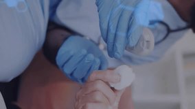 Animation of dna strand over diverse doctor and patient using glucose meter. Global science, medicine, healthcare, lifestyle and digital interface concept digitally generated video. - Powered by Shutterstock - Get 15% off with code: PIKWIZARD15