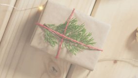 Have jolly holiday text animation over Christmas gift wrapping with festive decorations. seasonal, celebration, winter, design, merry - Powered by Shutterstock - Get 15% off with code: PIKWIZARD15