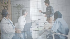 Doctor writing on flipchart causing animated green line graph showing medical data trends with team. Medical, conference, analysis, data, presentation, teamwork, professional - Powered by Shutterstock - Get 15% off with code: PIKWIZARD15