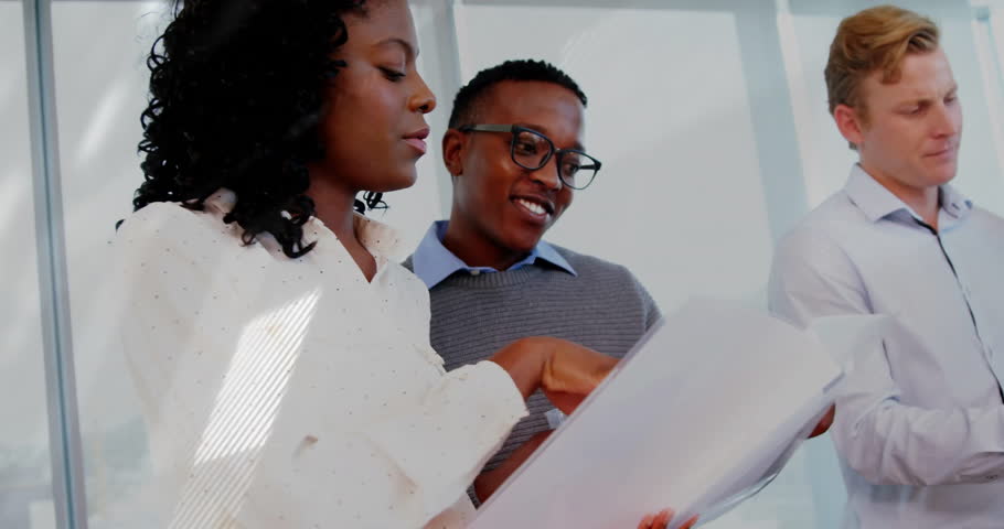 Business manager pointing chart sparking team reviewing data, man unveiling tablet showing graphs. Collaboration, teamwork, analytics, strategy, corporate, innovation, communication