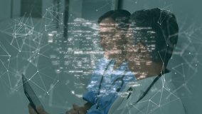 Nurse and physician reviewing medical data on tablet, network forming fingerprints, shield locking. Healthcare, digital security, cybersecurity, innovation, teamwork, professionalism, technology - Powered by Shutterstock - Get 15% off with code: PIKWIZARD15