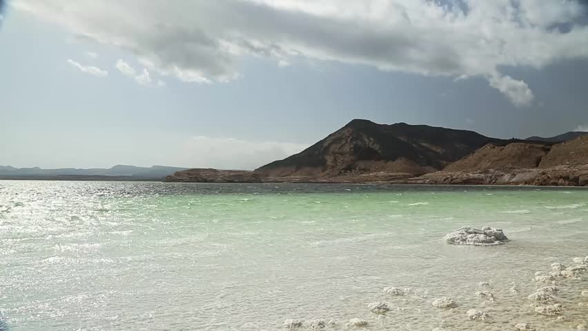 Ground-Level View of Lac Assal’s Salt Crust and Turquoise Waters in Djibouti