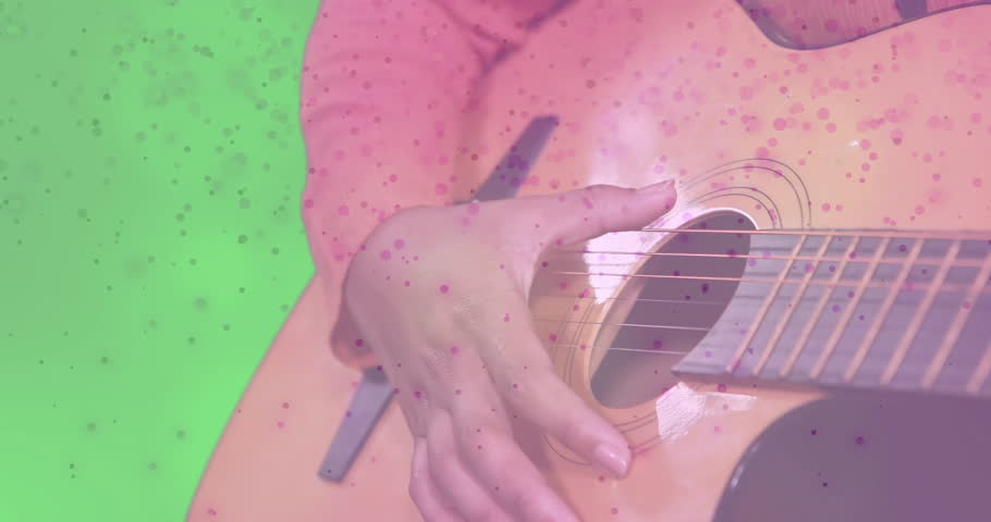 Artist's fingers hovering then plucking and strumming guitar strings speckle overlay for music demo. Instrument, melody, performance, rhythm, harmony, creativity, studio