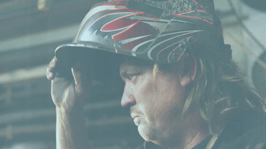 Welder raising helmet visor inspecting inside while animated bar chart updating production metrics. Industrial, craftsmanship, digital, analytics, safety, technology, vitality