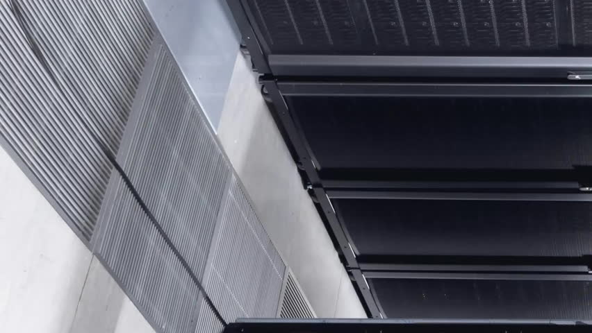 Animation of multicolored computer language over data server racks in server room. Digital composite, coding, programming language, data center, networking, technology and network server concept. - Powered by Shutterstock - Get 15% off with code: PIKWIZARD15