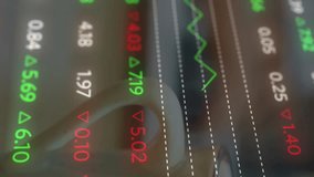 Animation of stock market data processing over mid section of a woman using laptop at a cafe. Global economy and business data technology concept - Powered by Shutterstock - Get 15% off with code: PIKWIZARD15