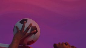 Animation of charts processing data over african american male footballer holding ball on purple. Network, data, sport, competition, digital interface and communication, digitally generated video. - Powered by Shutterstock - Get 15% off with code: PIKWIZARD15