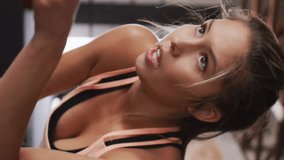 Animation of digital data processing over woman exercising in gym. Global sports, fitness, connections, computing and data processing concept digitally generated video. - Powered by Shutterstock - Get 15% off with code: PIKWIZARD15