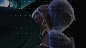 Animation of cardiograph over diverse surgeons operating on patient at hospital. Medicine, healthcare and digital interface concept digitally generated video. - Powered by Shutterstock - Get 15% off with code: PIKWIZARD15