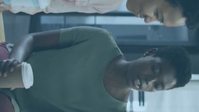 Animation of multiple graphs over diverse female coworkers discussing and drinking coffee in office. Digital composite, multiple exposure, report, business, beverage, planning and teamwork concept. - Powered by Shutterstock - Get 15% off with code: PIKWIZARD15