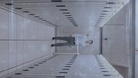 Animation of data processing over caucasian male worker in server room. Global technology and digital interface concept digitally generated video. - Powered by Shutterstock - Get 15% off with code: PIKWIZARD15
