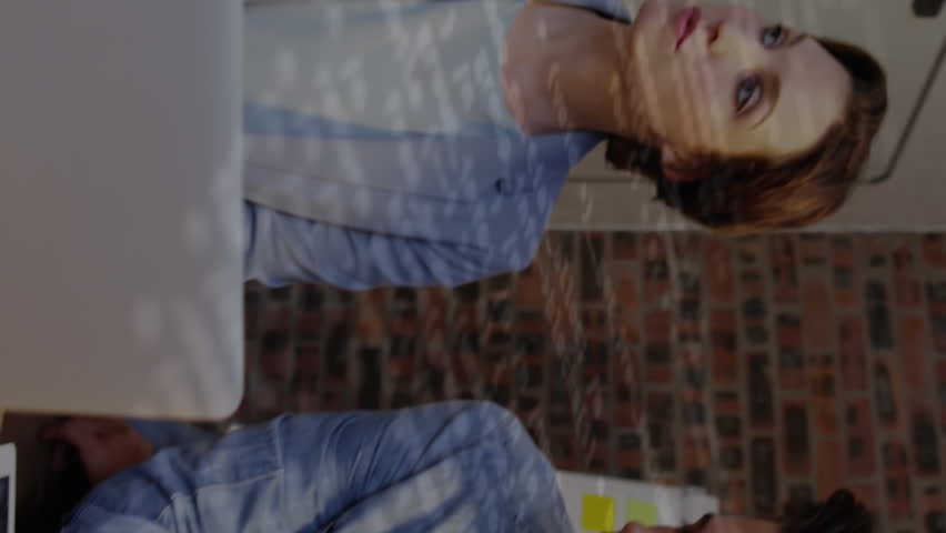 Animation of data processing over diverse business people using computer. Global business data processing connections technology and digital interface concept digitally generated video. - Powered by Shutterstock - Get 15% off with code: PIKWIZARD15