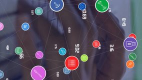 Animation of network of connections with icons over african american businessman using computer. Global connections, cloud computing and data processing concept digitally generated video. - Powered by Shutterstock - Get 15% off with code: PIKWIZARD15