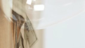 Animation of banknotes on table over hourglass. Business, technology and digital interface concept digitally generated video. - Powered by Shutterstock - Get 15% off with code: PIKWIZARD15