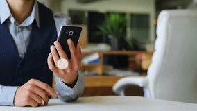 Man tapping smartphone and visualizing tech network growth with icons spreading across workspace. Technology, connectivity, digital, network, communication, innovation, workspace - Powered by Shutterstock - Get 15% off with code: PIKWIZARD15