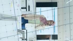 Animation of financial data processing over businesswoman in hijab working in office. Global business, finance, computing and data processing concept digitally generated video. - Powered by Shutterstock - Get 15% off with code: PIKWIZARD15
