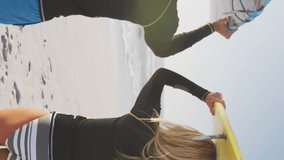 Animation of red heart love balloons digital icons over couple carrying surfboards on beach. digital interface, social media and global networking concept digitally generated video. - Powered by Shutterstock - Get 15% off with code: PIKWIZARD15