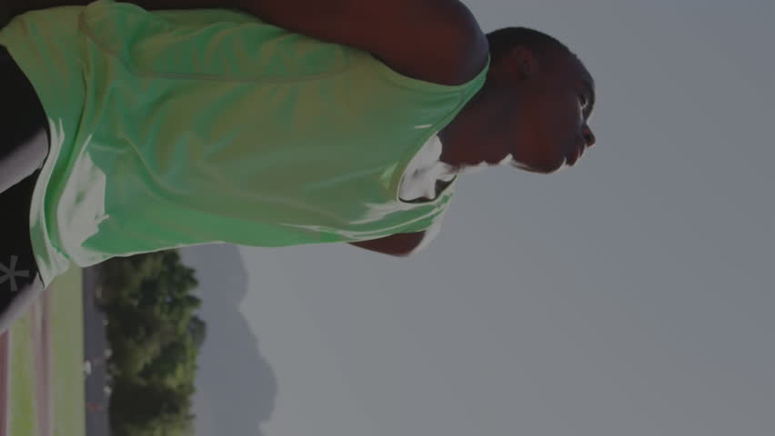 Animation of digital data processing over disabled male athlete with running blades on racing track. global sports, competition, disability and digital interface concept digitally generated video. - Powered by Shutterstock - Get 15% off with code: PIKWIZARD15