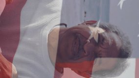 Animation of flag of united states of america and portrait of senior man on beach. American patriotism, diversity and tradition concept digitally generated video. - Powered by Shutterstock - Get 15% off with code: PIKWIZARD15