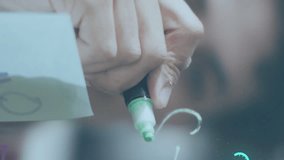 Animation of data processing over businessman taking notes on glass wall. Global business and digital interface concept digitally generated video. - Powered by Shutterstock - Get 15% off with code: PIKWIZARD15