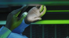 Animation of binary coding over african american male it engineer and computer servers. Global computing and data processing concept digitally generated video. - Powered by Shutterstock - Get 15% off with code: PIKWIZARD15