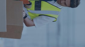 Animation of data processing on screen over caucasian man working in warehouse. Global shipping, networks, digital interface, computing and data processing concept digitally generated video. - Powered by Shutterstock - Get 15% off with code: PIKWIZARD15