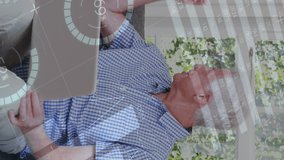 Animation of financial data processing over caucasian couple using laptop. Global computing, digital interface and data processing concept digitally generated video. - Powered by Shutterstock - Get 15% off with code: PIKWIZARD15