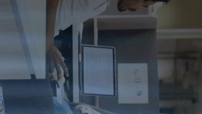 Animation of financial data processing over diverse business people in office. Global business, connections, computing, digital interface and data processing concept digitally generated video. - Powered by Shutterstock - Get 15% off with code: PIKWIZARD15