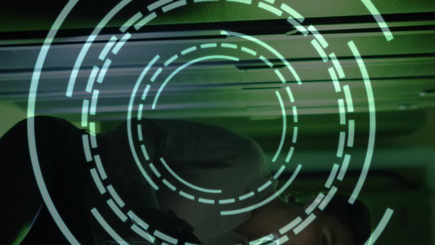 Digital target animation over person using tablet in dark server room. Technology, innovation, cybersecurity, data analytics, network - Powered by Shutterstock - Get 15% off with code: PIKWIZARD15