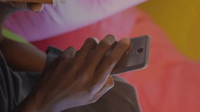 Man holding phone and drink with stock market data animation overlay. Finance, trading, technology, investment, economy, business - Powered by Shutterstock - Get 15% off with code: PIKWIZARD15