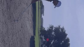 Golfer preparing swing in sand trap with data processing animation overlay. sports, athlete, technology, analysis, performance, training - Powered by Shutterstock - Get 15% off with code: PIKWIZARD15