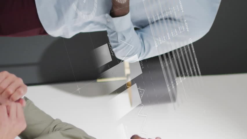 Animation of infographic interface and diverse manager explaining project details to colleagues. Digital composite, business, report, progress, meeting, teamwork, presentation, office, technology. - Powered by Shutterstock - Get 15% off with code: PIKWIZARD15