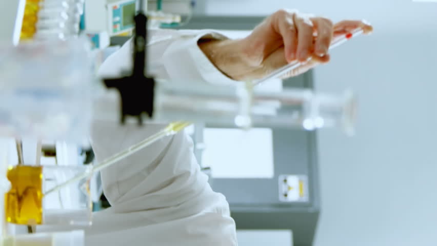 Animation of mathematical equations over caucasian male scientist in lab. global science and digital interface concept digitally generated video. - Powered by Shutterstock - Get 15% off with code: PIKWIZARD15