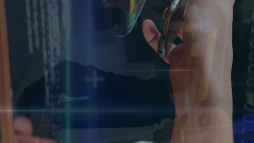 Animation of statistics and financial data processing over man using smartphone. Global business and digital interface concept digitally generated video. - Powered by Shutterstock - Get 15% off with code: PIKWIZARD15